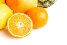 Group Of Tropical Fruits, Sliced Orange Halves Isolated On White Background