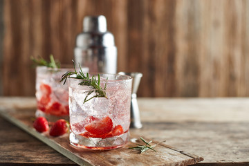 Holiday cold sparkling drink for party with ripe strawberry. .