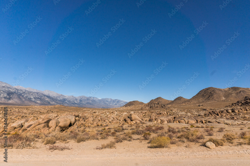 Dirt Road into Alabama Hills Sierra Nevada Range California with a view ...