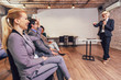 © Mediteraneo - Speaker giving a talk in conference hall at business event.