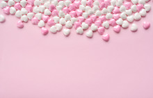 Candy Valentines Hearts On Pink Background.