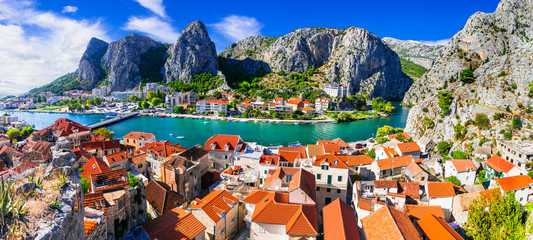 Wall Mural - Landmarks of Croatia - impressive Omis town popular tourist destination for trekking and rafting over Cetina river