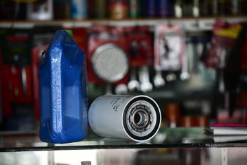 Car lubricant and oil filter in the store for maintenance service.