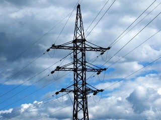 Cables, power lines, electric transmission tower.