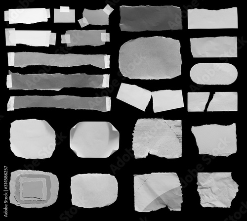 Fotomural Set of torn paper texture on black background, copy space.