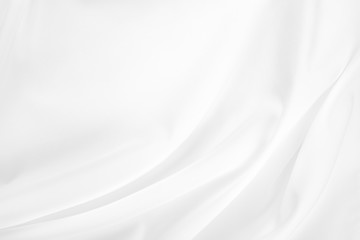 Abstract white fabric texture background. Cloth soft wave. Creases of satin, silk, and cotton.