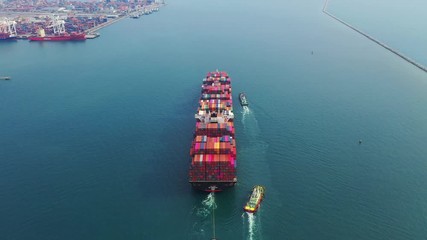 Wall Mural - Aerial view of large container cargo ship in sea.