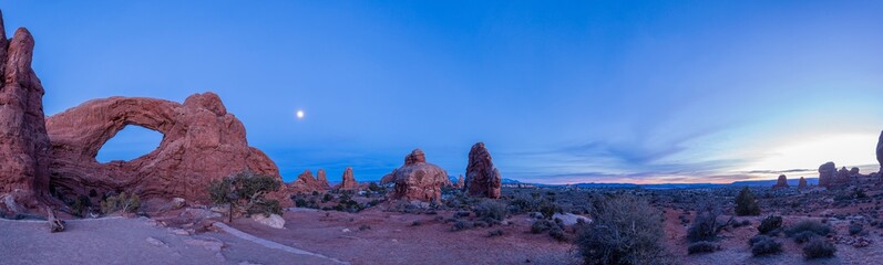 Wall Mural - Panoramic picture of impressive sandstone formations in Arches National Park at night in winter