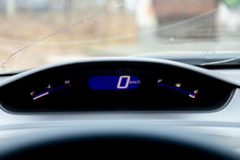 Close Up Instrument Automobile Panel With Odometer, Speedometer, Tachometer, Fuel Level.