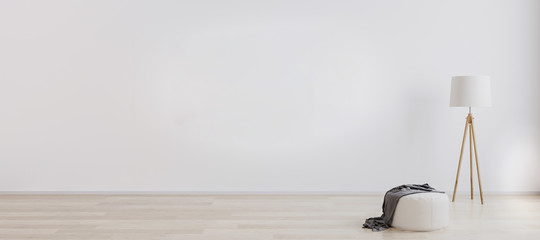 Wall Mural - bright room interior for mockup with wooden floor lamp, white pouf and wooden floor with white wall.