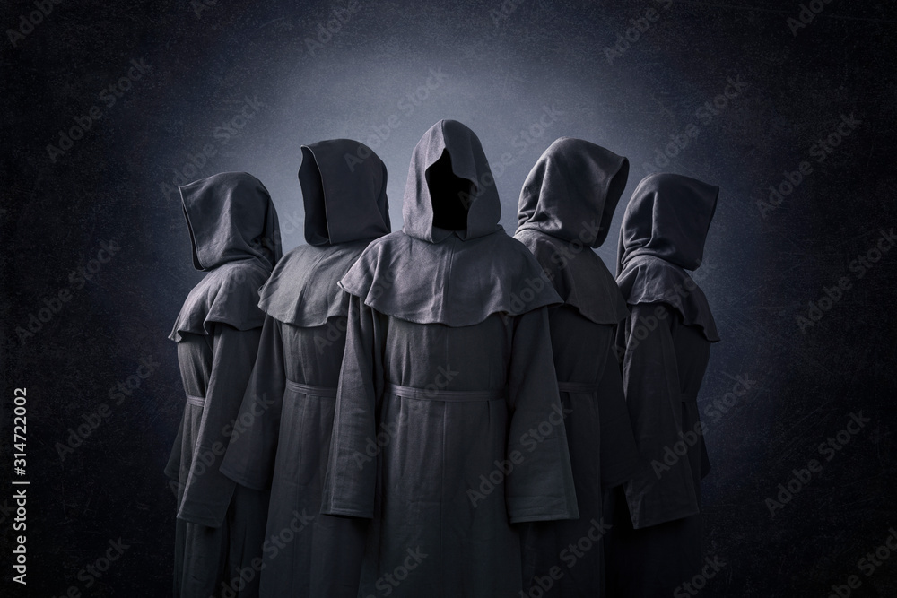 Group of five scary figures in hooded cloaks in the dark - obrazy, fototapety, plakaty 