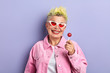 © alfa27 - happy granny with stylish hairdo has bought lollipop for her grandson. sweet life. optimism. happiness