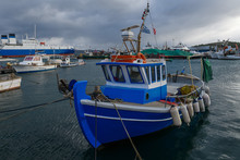 Small Fishing Boat Moored In The Port