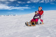 © Andrey Popov - Mother And Daughter Enjoying Sledge Ride In Winter Park