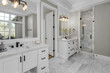 canvas print picture - Beautiful bathroom in new luxury home with two vanities, sinks, and mirrors Shows shower with tile and wand