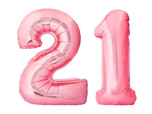 Number 21 Twenty One Made Of Rose Gold Inflatable Balloons Isolated On White Background. Pink Helium Balloons Forming 21 Twenty One Number. Legal Age Birthday Concept