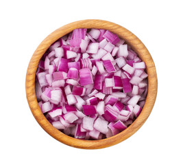 Wall Mural - chopped red onions in a wooden bowl isolated on white background, top view