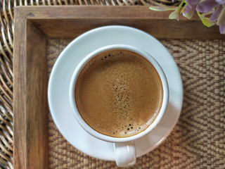 Espresso coffee in white cup