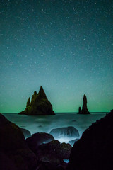 Wall Mural - Aurora Borealis (Northern Lights) above Vik rock formation, Iceland