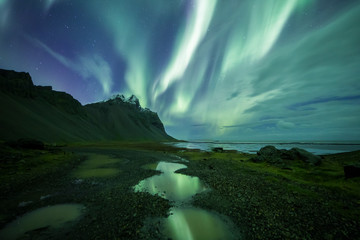 Wall Mural - Aurora Borealis (Northern Lights) above Stokksnes Beach and Vestrahorn Mountains, Iceland