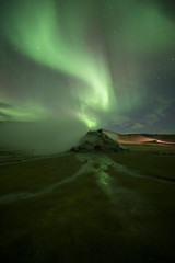 Wall Mural - Aurora Borealis (Northern Lights) above geothermal volcanic vents in Hveravellir