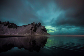 Wall Mural - Aurora Borealis (Northern Lights) above Stokksnes Beach and Vestrahorn Mountains, Iceland