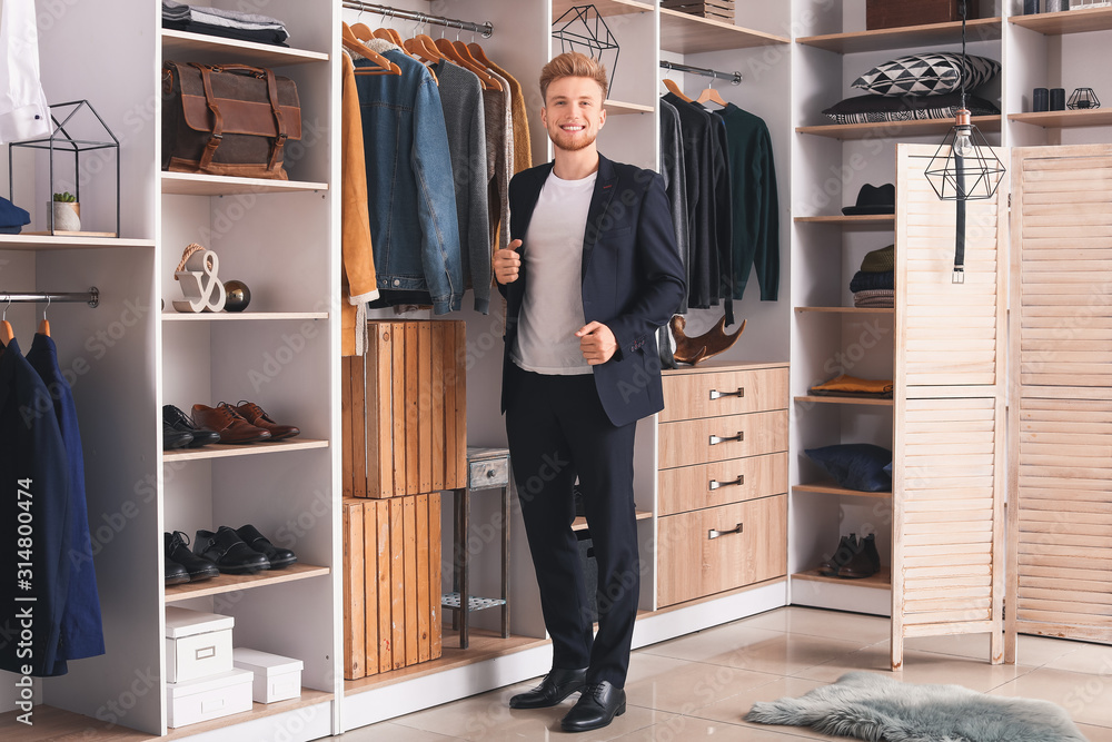 Stylish young man in dressing room