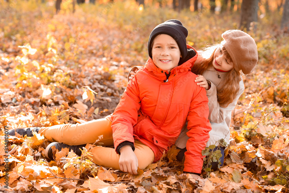 Cute little children in autumn park