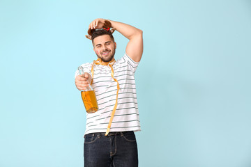 Poster - Drunk man with champagne on color background