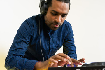 Sticker - Male DJ playing music on white background