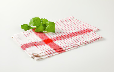 Wall Mural - Tea towel and basil leaves