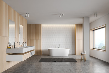 White tile and wooden bathroom, tub and sink