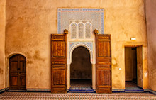 Detail Of Islamic Mosque. It Is An Old Architectural Building In The Middle Of The Moroccan City. There Are Red Bricks.
