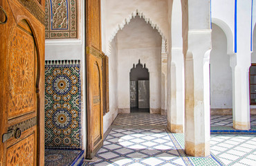 detail of islamic building. it is an old architecture in the middle of the moroccan city. there are 