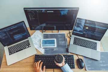 Developing programmer Development Website design and coding technologies working in software company office