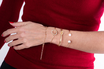 Wall Mural - arm woman bracelets jewelry on hand