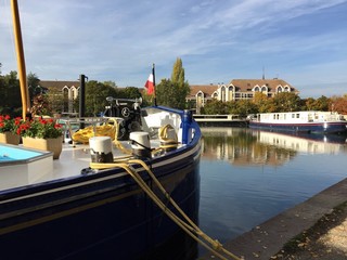 The Canal Port in Dijon is an old river harbor on the Burgundy Canal, a canal in central eastern France.