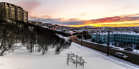 Poster - Murmansk, Russia - January, 12, 2020: Landscape with the image of traffic in Murmask during the polar night