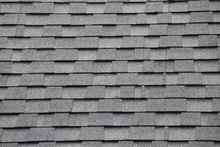 Roof Shingles Background And Texture. Grey And Black Asphalt Tile Of House Roof.