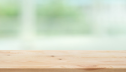 Wall Mural - Empty wood table top on blur abstract green garden from window view