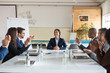 © Mangostar - Subordinates applauding successful Asian speaker. Group of smiling business people during morning briefing. Business meeting concept