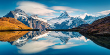 Panoramic Morning View Of Bachalp Lake / Bachalpsee, Switzerland. Majestic Autumn Scene Of Swiss Alps, Grindelwald, Bernese Oberland, Europe. Beauty Of Nature Concept Background.