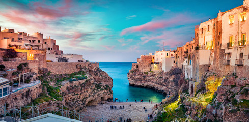 Wall Mural - spectacular spring cityscape of polignano a mare town, puglia region, italy, europe. colorful evenin
