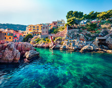 Sunny Spring View Of Sant' Elia Village. Splendid Azure Water Bay On Sicily, Palermo City Location, Italy, Europe. Traveling Concept Background.