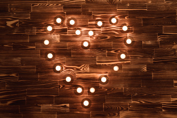 Wall Mural - Vintage wooden background with tea light candles border and red heart shape, valenitnes day concept.