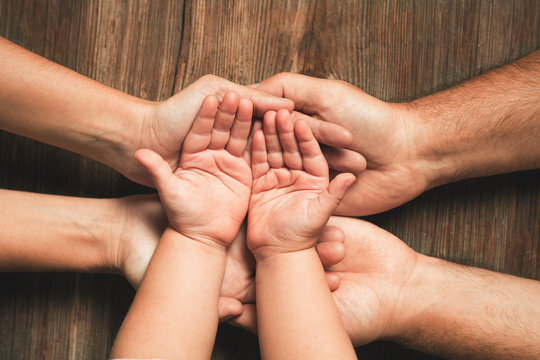three hands of family. love, togetherness, happiness in family concept.