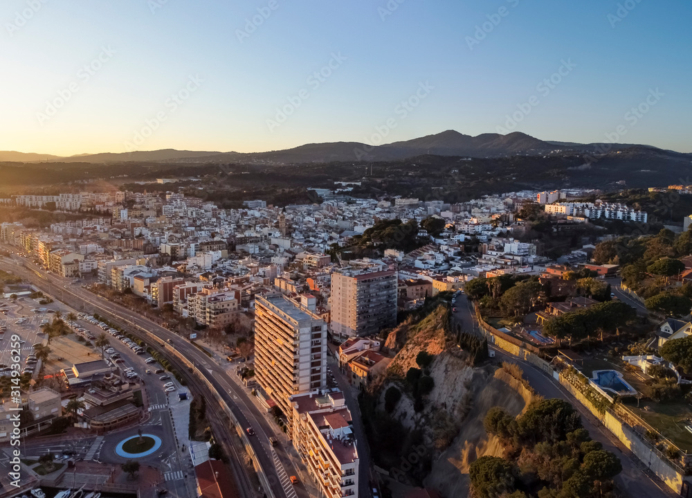 Aerial panoramic view of Arenys de Mar city at dawn. Located in El ...