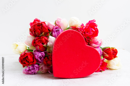 Fresh tulips flowers with heart