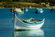 A luzzu is a traditional fishing boat from the Maltese islands. Painted in bright colours, luzzus have existed sin