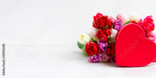 Fresh tulips flowers with heart